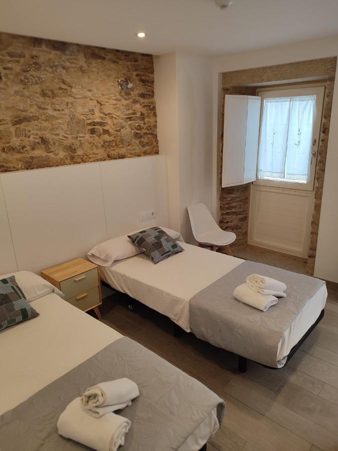 Quarto Duplo com 2 Camas de Casal